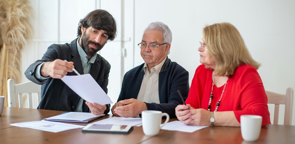 Couple being shown a document