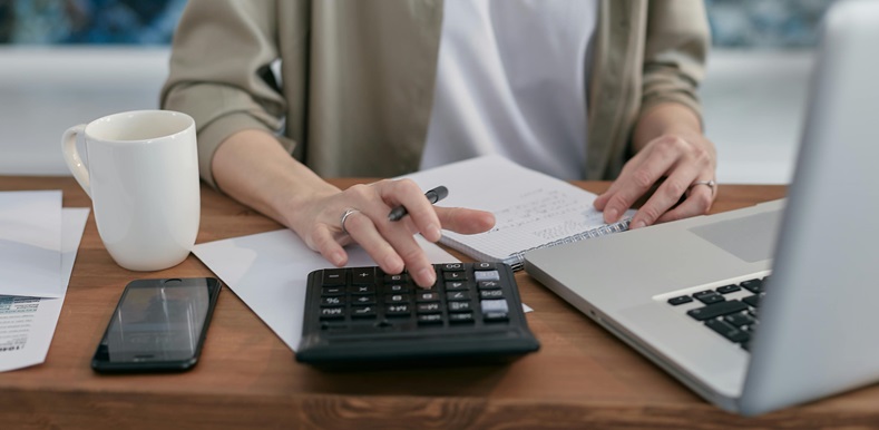 Man Working with a Calculator