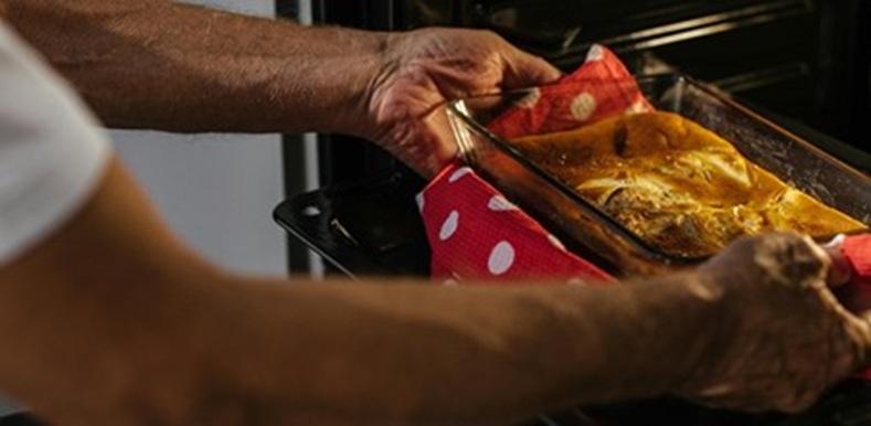 Person holding a food tray