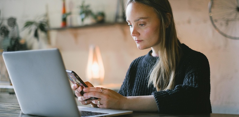 Woman browsing smartphone