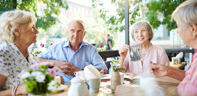 Elderly woman sharing story of her family