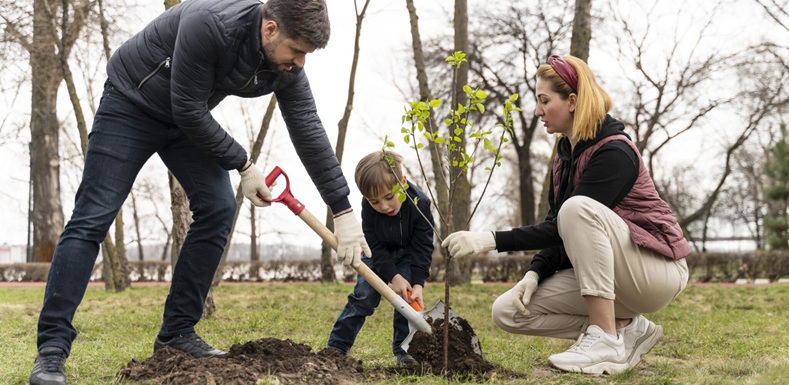 family-planting-together-tree