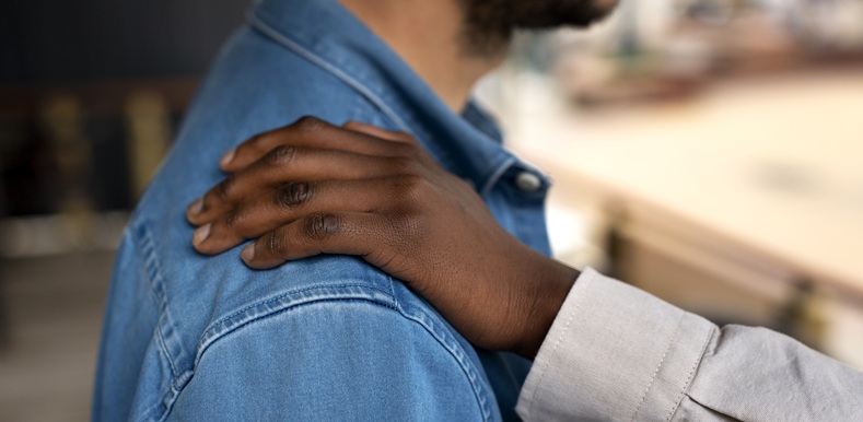 hands-embracing-person-support